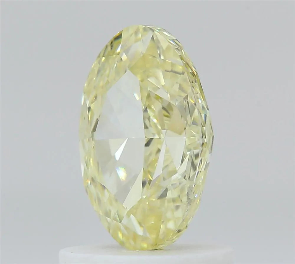 1.01ct Oval Natural Diamond (Colour Fancy Light Yellow, Clarity VS2, GIA Certified)