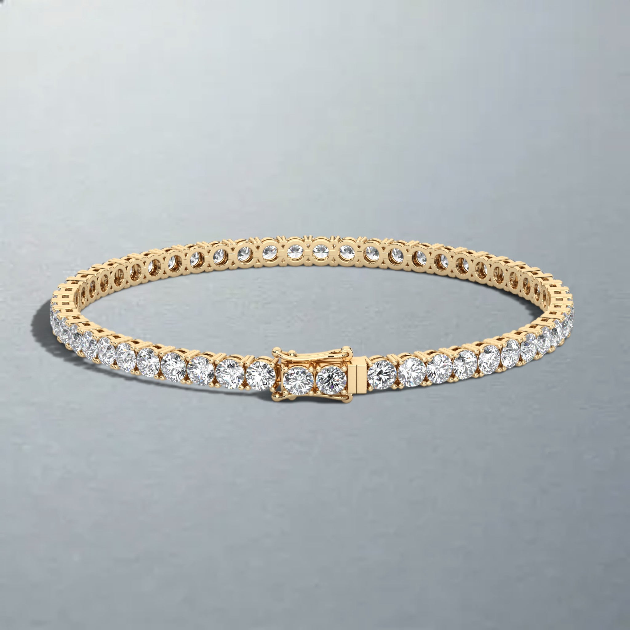 Carateu 6.00ct lab diamond tennis bracelet with 3mm yellow gold links, featuring sparkling DEF/VS clarity diamonds.