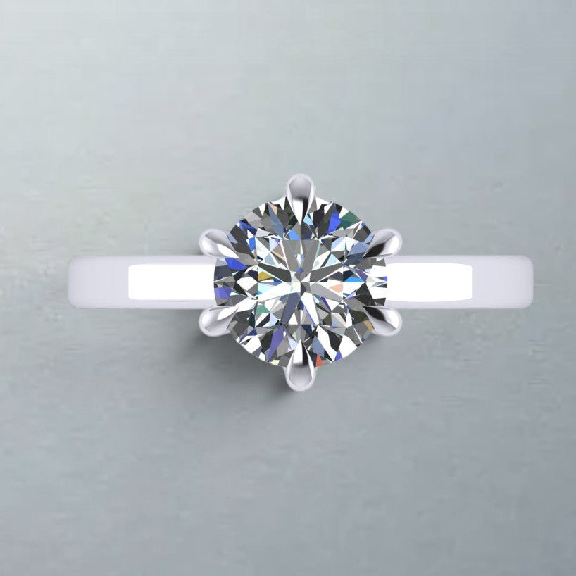 Custom 18kt white gold ring by Carateu, size 51.50, featuring a sleek band and polished finish.