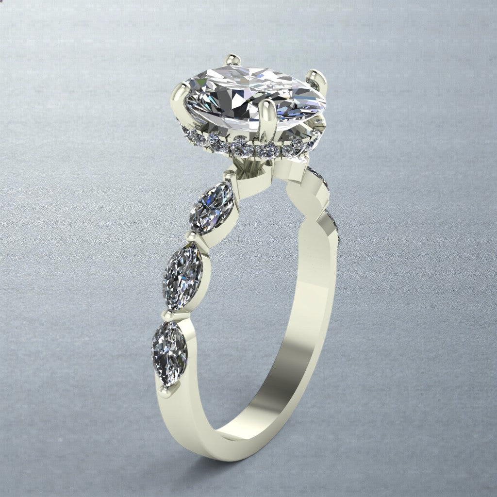 Carateu oval diamond ring with hidden halo and marquise band, showcasing detailed craftsmanship and elegant design.