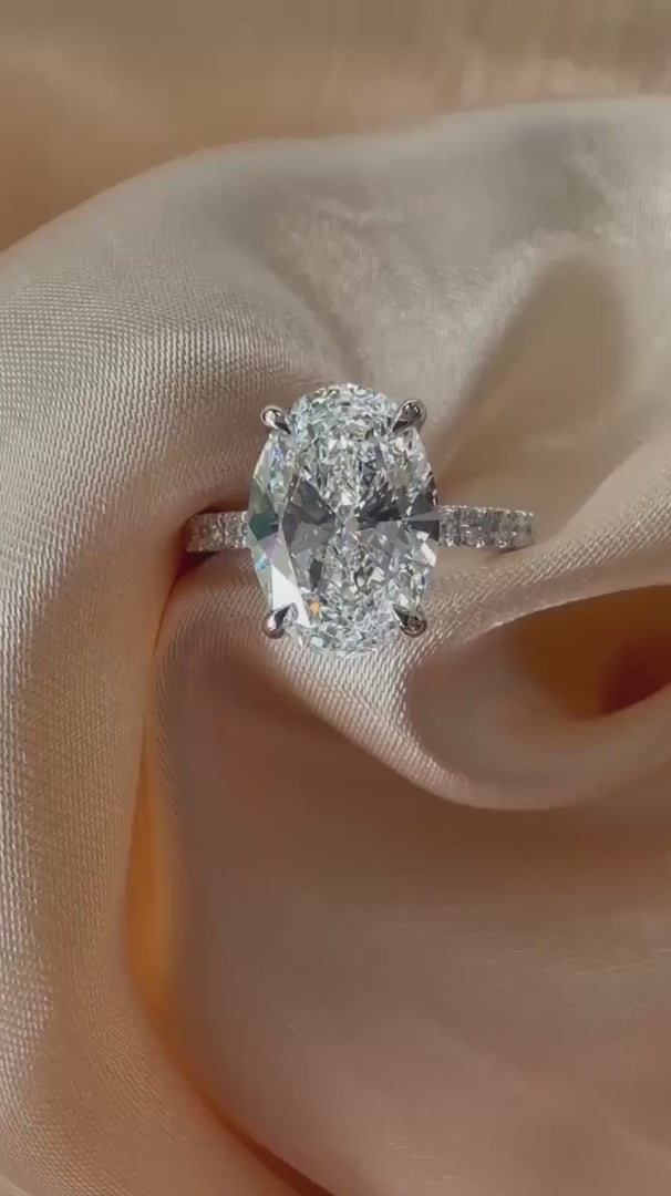 Hidden halo with pavé band setting ring